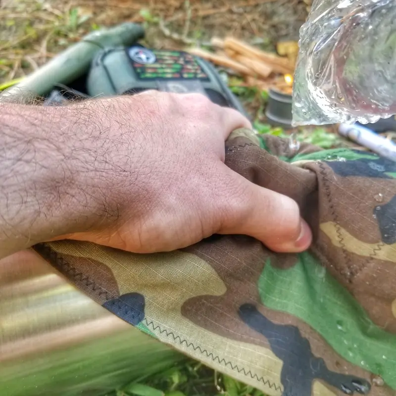 Dual-Purpose Filter Bandana: Pre-Filtration Water Aid and Respiratory Barrier Against Airborne Contaminants