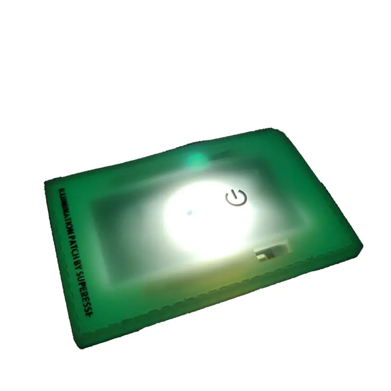 Illumination Morale Patch – Integrated Flashlight and Chemlight for Low-Light Utility